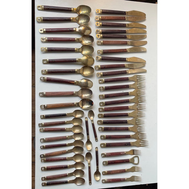 This dining/lunch set by Carl Cohr was manufactured and designed in Denmark during the 1960s. The set consists of 12...