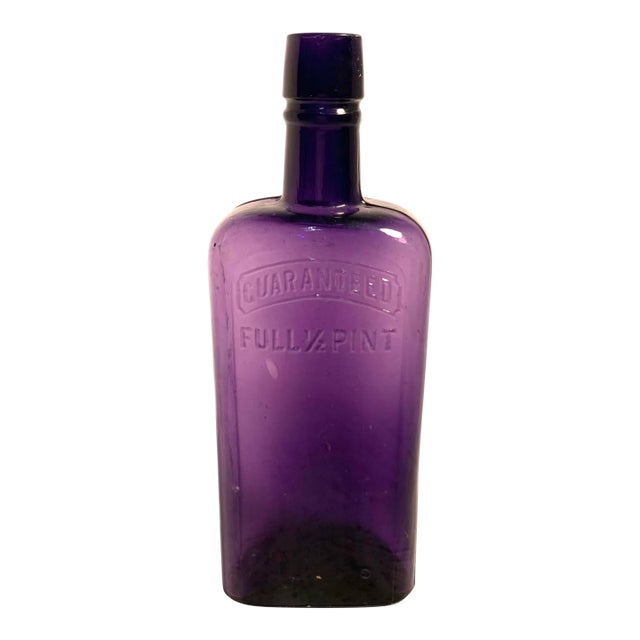 Early 20th C. Amethyst Embossed Half-Pint Whiskey Bottle For Sale