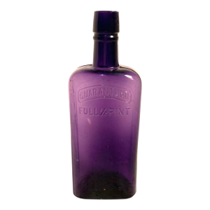 Early 20th C. Amethyst Embossed Half-Pint Whiskey Bottle