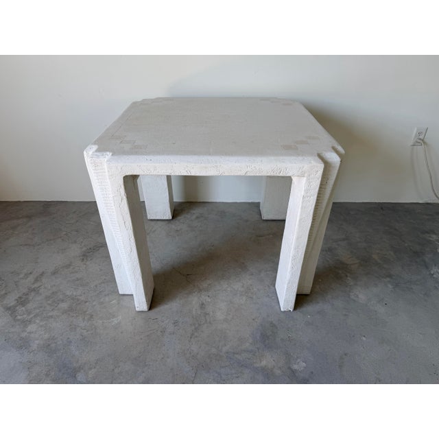 Exceptional 1980’s postmodern game or dining table featuring a bold geometric silhouette with sculptural angular legs and...