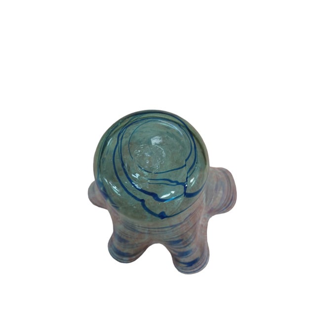 Vintage handblown art glass handkerchief base . Blue and opalescent in color.