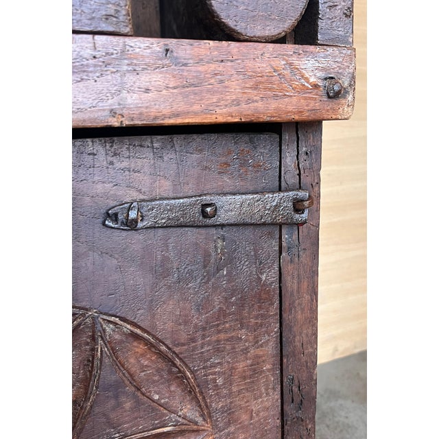 19th century Spanish cupboard or buffet constructed from walnut. Features a two parts with four doors . This massive...