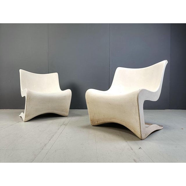 Very rare set of 2 acrylic glass shell lounge chairs designed by M. Borgant for Clairitex. The chairs where used and can...