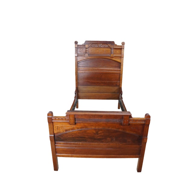 This magnificent 19th-century Victorian Eastlake period bed is an exceptional example of heirloom craftsmanship,...
