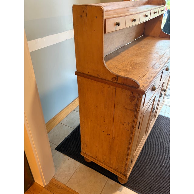 Up for sale in Sunapee Harbor is a Antique English Sideboard with storage. This beautiful antique piece came from the...