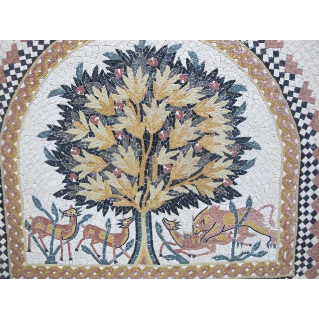 Mosaic tile reproduction of the famous "Tree of Life" located in Hisham's Palace in Jericho. Set in dark wood frame with...