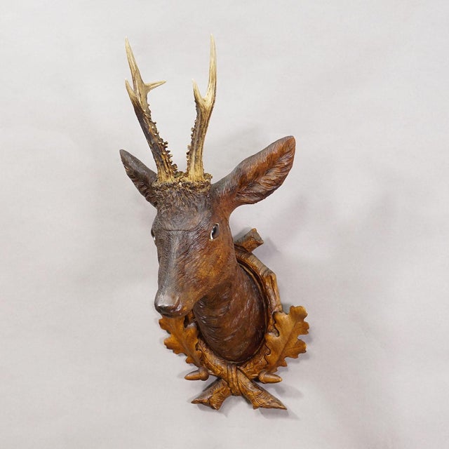 Large Naturalistic Black Forest Carved Deer Trophy, ca. 1920s Item e8157 A rare antique wooden carved Black Forest red...