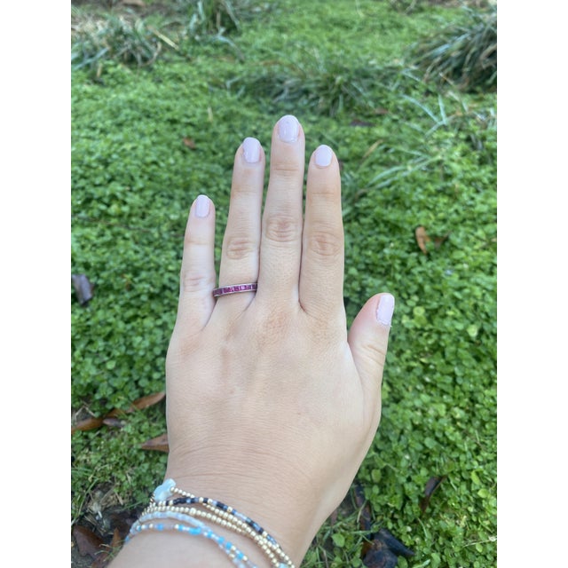 Stones: ruby, 56 stones square cut 2.25 mm approximately 5.6 total carats Ring Size 6 Width: 3.3 mm Weight: 2.4 dwts. /...