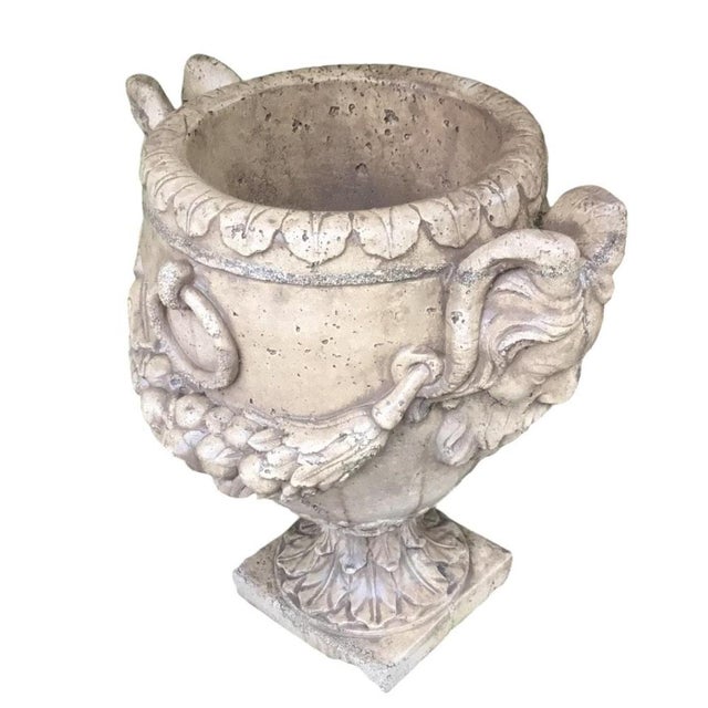 Add a touch of classical elegance to your garden with this grand pair of stone vases. Each vase measures 80 cm in height...