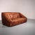 Exceptional and rare 1970s Italian two-seater leather sofa with outstanding handcrafted details. This unique vintage piece...