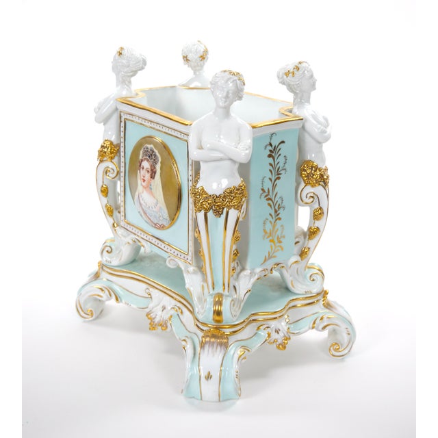 A magnificent late 19th-century French porcelain cachepot or centerpiece vase in the distinctive classical style...