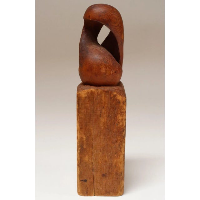 Modernist organic-form sculpture on base - all hand-carved from one continuous piece of wood (circa 1950s, USA). Subject...