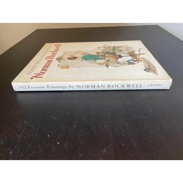 Renowned American Artist Norman Rockwell's book has 102 of his full color humourous illustrations of American life with...
