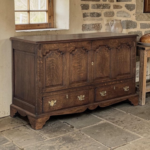 18th Century English Oak Mule Sideboard ~ Chest ~ Credenza is a handsome piece, crafted in the traditional form that...