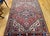 "A beautifully preserved vintage Persian Heriz area rug from the second quarter of the 20th century, presenting a striking...