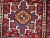 Handmade antique Persian Karajeh rug in original good condition. It has been made in the beginning of 20th century in red...