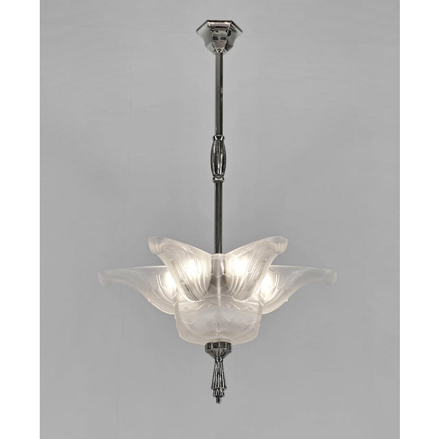 Verreries des Hanots A rare 1925-1935 French art deco pendant in nickel plated bronze or solid brass holding a stunning...