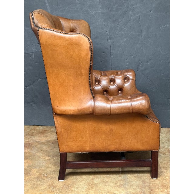 Wood Large English Wing Back Chair of Tufted Tanned Leather With Nail-Head Trim For Sale - Image 7 of 16