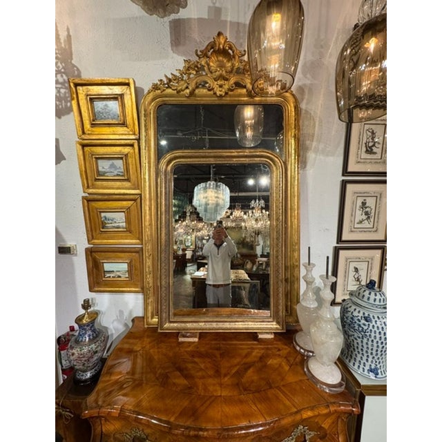The 19th c. French Louis Philippe Mirror with X Pattern Frame is an elegant piece of home décor. Featuring intricate...