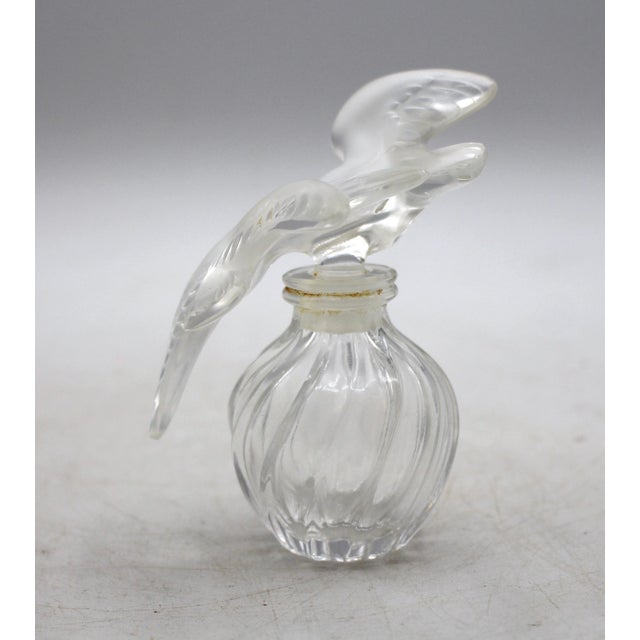 Love birds glass perfume bottle by Lalique for Nina Rico, France, circa 1950-60s. Blown crystal with classic frosted to...