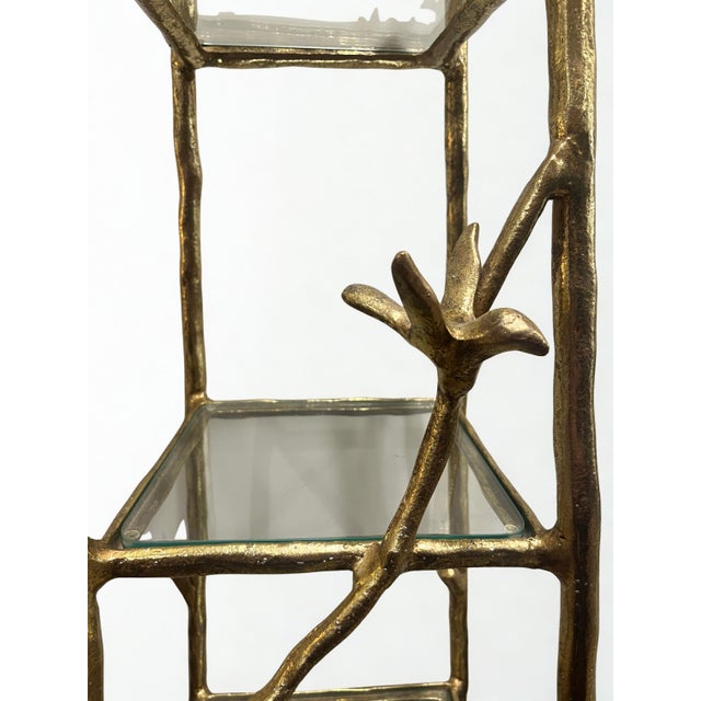 Aviary Étagère A striking gold metal Aviary Étagère featuring an organic branch‑and‑twig sculptural frame accented with...