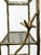 Aviary Étagère A striking gold metal Aviary Étagère featuring an organic branch‑and‑twig sculptural frame accented with...