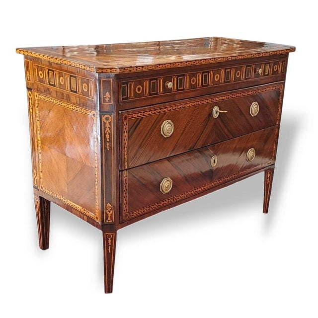 A precious three-drawer chest of drawers in the louis xvi style, a refined expression of piedmontese cabinetmaking from...