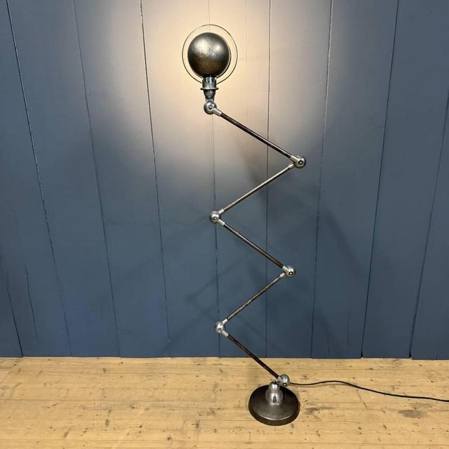 Polished 5-arm Jieldé floor lamp with a green Jieldé brand plate. Designed by the French engineer Jean-Louis Domecq in the...
