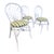 Charming set of three vintage rattan dining or accent chairs featuring a classic Palm Beach aesthetic. The frames have...