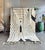 A striking contemporary interpretation of the iconic Beni Ourain rug, handwoven from natural wool by Berber artisans. The...