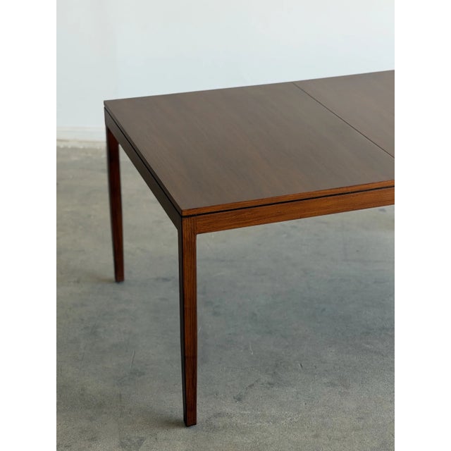 W56(no leaf) W84(with leaf) D38 LEAF W28 H28 KC24 This beautifully crafted solid walnut dining table with an etched detail...