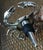 Tommy Bahama coastal crab bottle stopper with a silver-tone metal crab body and a sea shell centerpiece. Super cute...