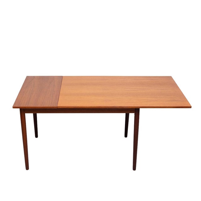 Very nice Teak Dining table .comes with One extension leaf . The Legs can be removed . The condition on this Table is...