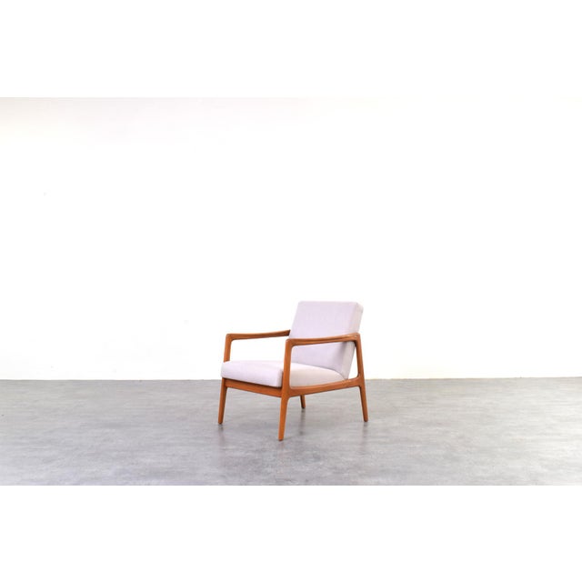 A classic scandinavian armchair designed by alf svensson for the swedish brand dux in the 1960s. It is a quintessential...