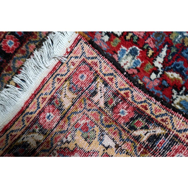Antique Persian Hamadan Runner – Distressed 1920s Wool Rug 2.5' x 10.3' A narrow and beautifully aged handmade Persian...