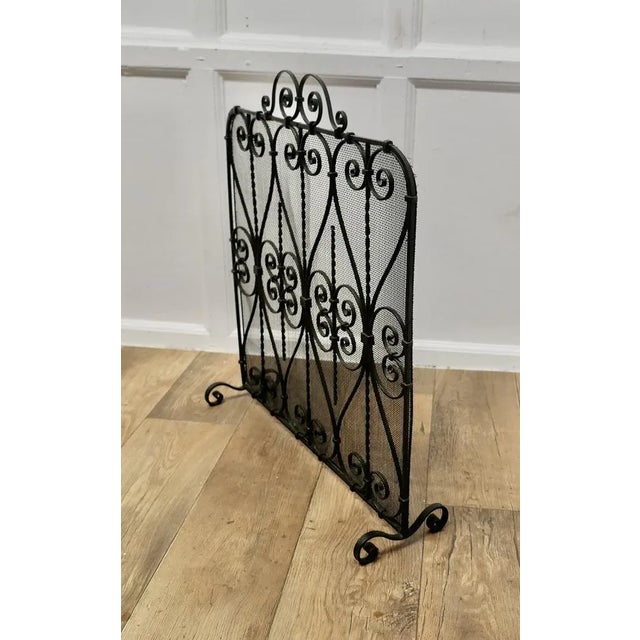 Wrought Iron Fire Screen This is an intricate and very attractive piece, the wrought iron work is superbly executed with a...