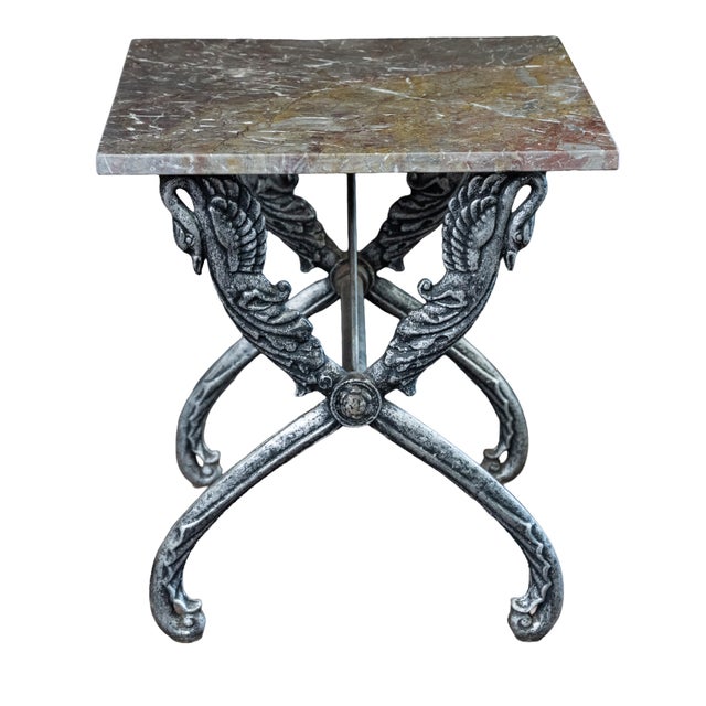 A fine French garden or conservatory table in the Neoclassical style, featuring a square figure marble top resting upon a...