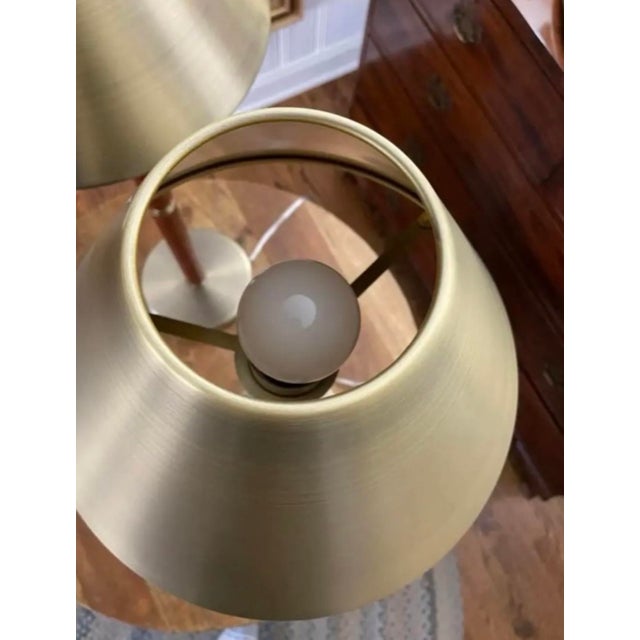 Beautiful pair of leather wrapped and brushed brass extra tall buffet lamps from Ralph Lauren. Unsure If the leather...