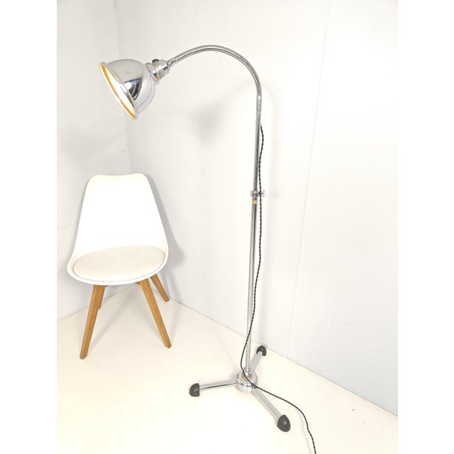 Original 1930s-1950s German floor light by Maquet.Bauhaus Design by Christian Dell. Features a striking minimalist three-...