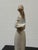 Design Plus Gallery presents the Porcelain Figurine Girl in Apron Holding Duck by NAO for Lladró. The tall, slender...