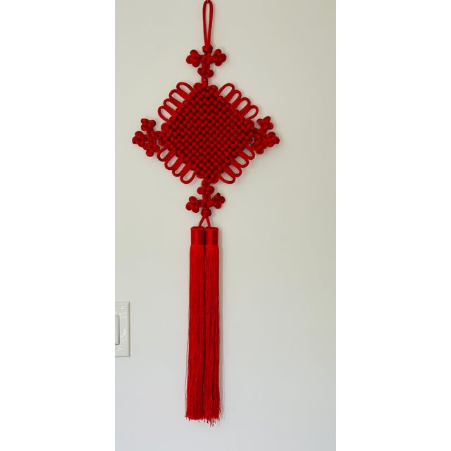Vintage Chinese Red silk handmade macrame sign of longevity. 33” by 13”.