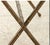 A striking vintage Hollywood Regency console table featuring a classic faux bamboo form in a warm, aged brass finish. The...