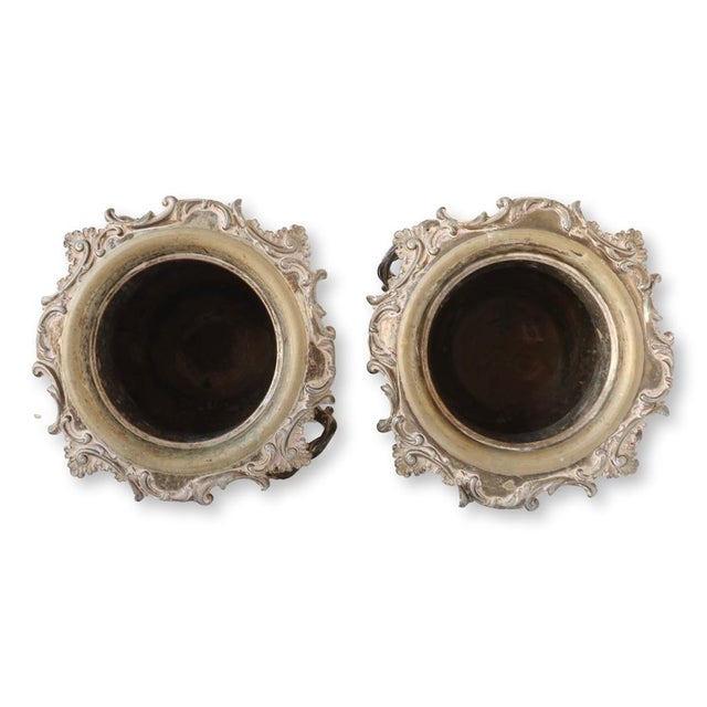 Handsome and substantial pair of early 19th century Sheffield silver-plate champagne buckets, each adorned with an ornate...