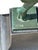 A beautiful and elegant patinated metal sculpture by Denis, circa 1930. Model "Folie," produced by Max Le Verrier. Green...