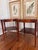 Absolutely beautiful pair of vintage early to mid 20th century letter top end tables with original leather tops and brass...