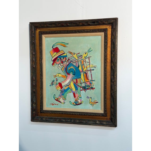 The Walking Shop oil on board painting by Jovan Obican. A colorful rendering of a street peddler. Circa 1970. Signed lower...