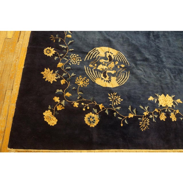 Textile Refined Floral Border on Navy Background and Black Border Antique Chinese Peking Rug For Sale - Image 7 of 10