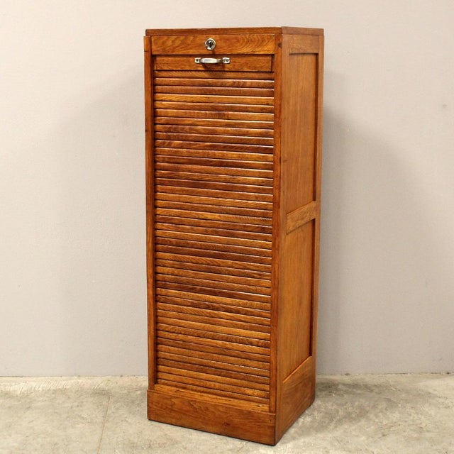 Single-shutter filing cabinet Made of oak Early 1900s Dimensions: width 43 cm, depth 36 cm, height 120 cm Restored (see...