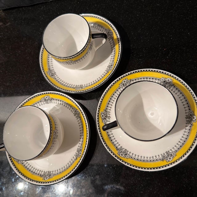 This elegant set of three antique tea cups and saucers showcases the early artistry of Royal Albert Crown China, dating to...