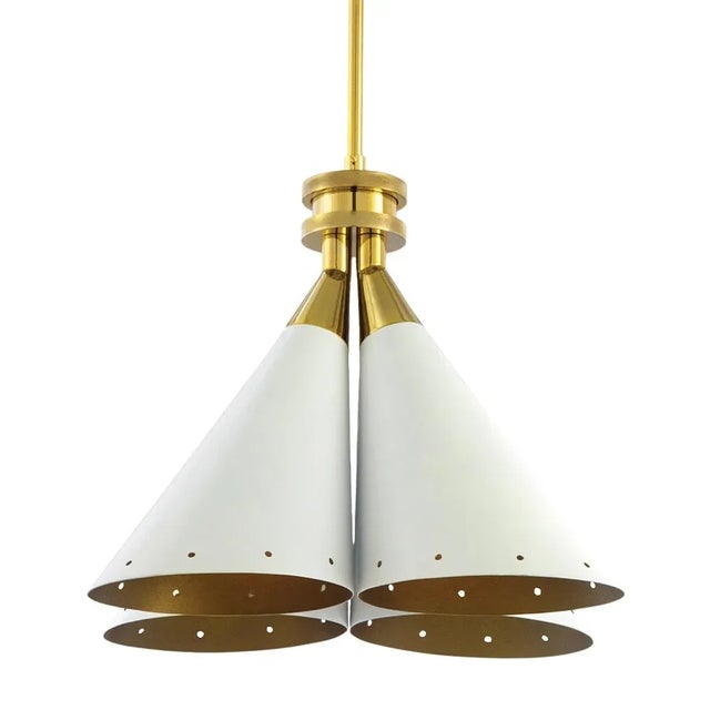 Inspired by a flower bouquet, DelightFULL’s designers designed Madeleine, an industrial pendant lighting. with four cone...